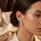 Gold Crisscross Pearl Stud Earrings